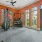 fitness center with large open spaces allowing room for workouts and for using equipment