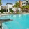 swimming pool with spacious seating areas and reclining chairs