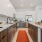 kitchen area with spacious counter-space and designer appliances