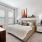spacious bedroom with large, open spaces