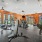 fitness center with large open spaces allowing room for workouts and for using equipment